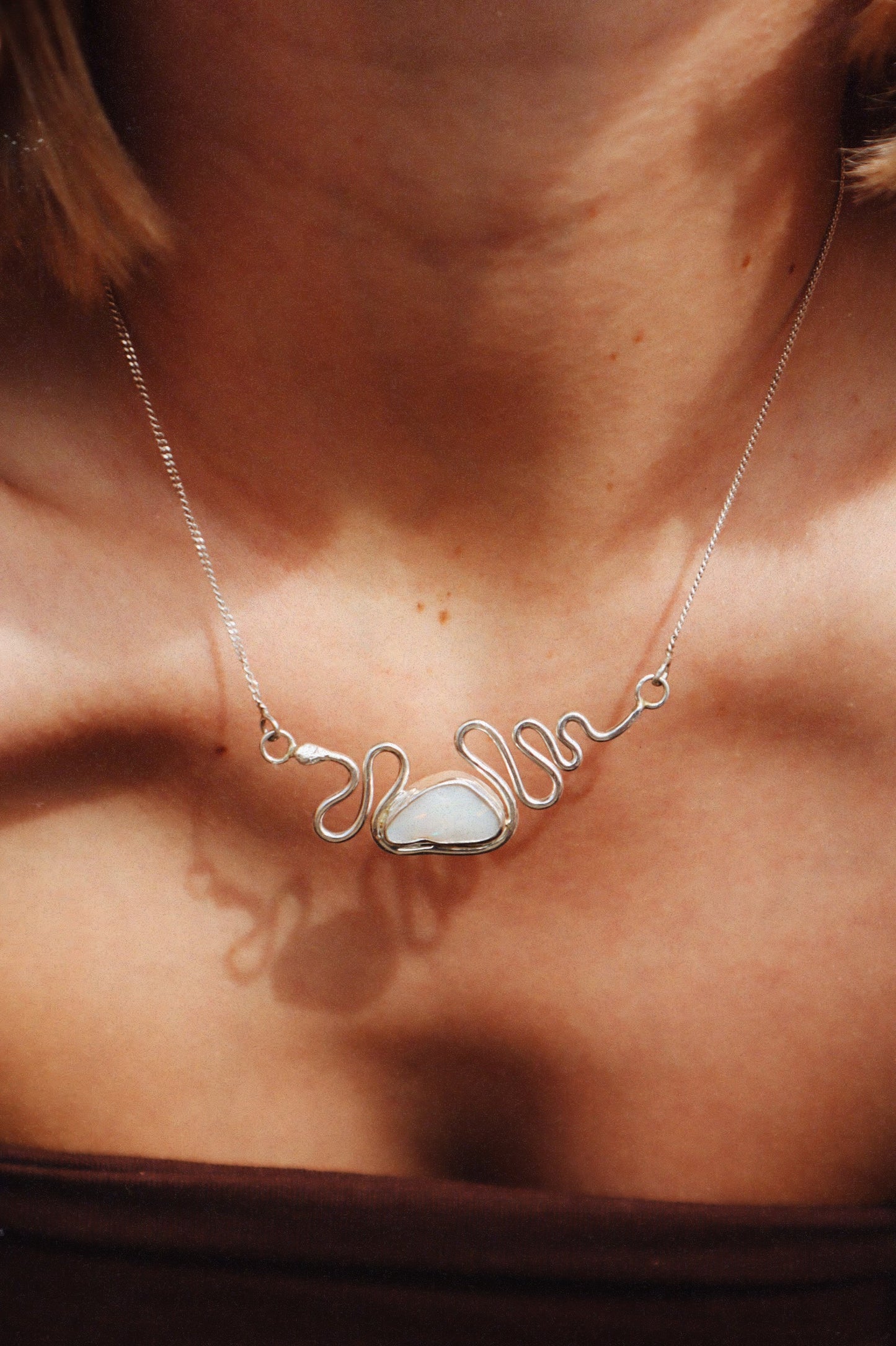 The Serpent’s Opal Pendant
