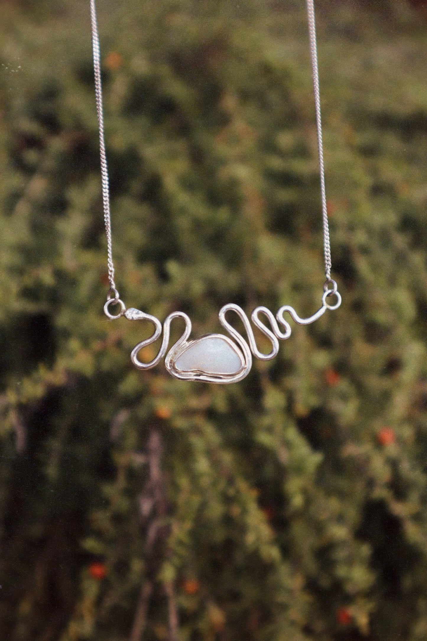 The Serpent’s Opal Pendant