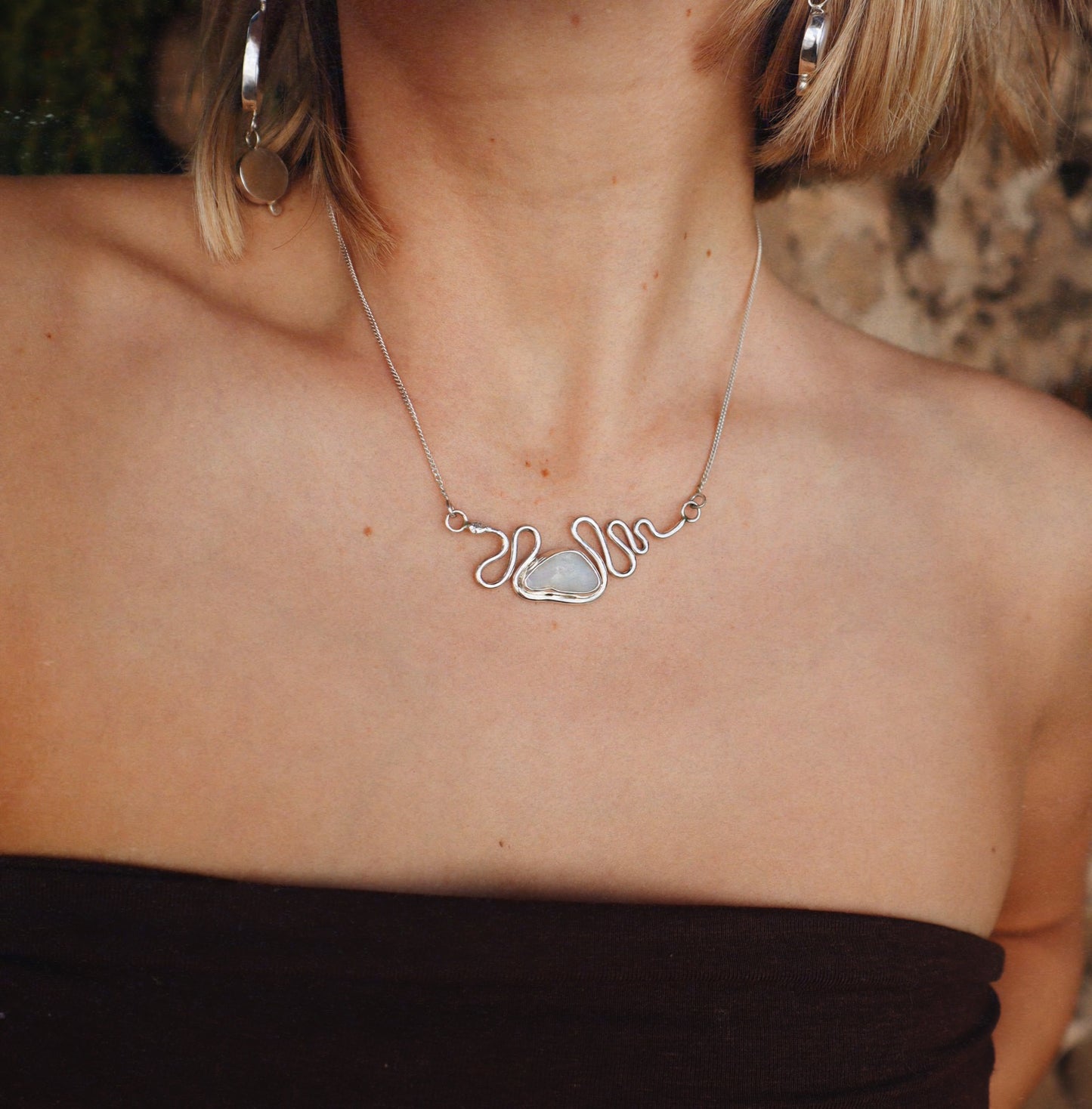 The Serpent’s Opal Pendant